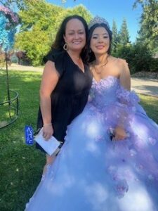 Nancy Lopez with her former kinder student at that students' quinceañera.